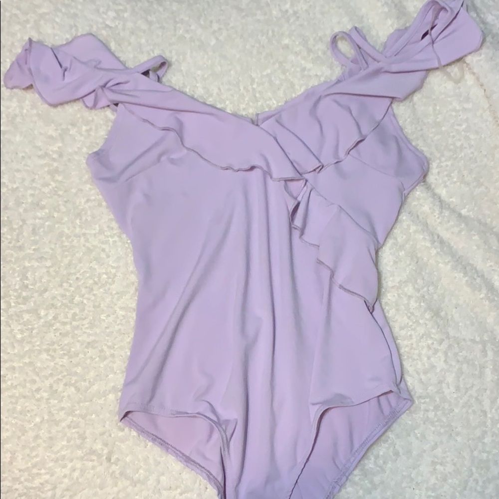 Purple ruffle body suit
